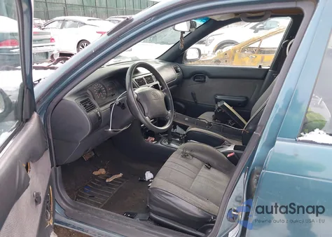 1995 Toyota Corolla из США, поврежденный, VIN 2T1AE04B7SC084635